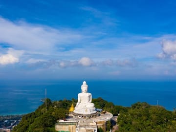 Aerial view big buddha white on the mountain at phuket thailand