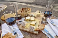 Enjoy a late evening degustation of select wine &amp; cheeses at the culmination of your walking tour!