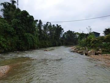 along the stream to visit H'mong