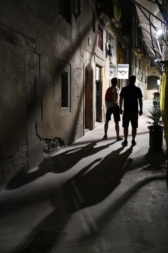 An empty narrow back alley in the historic center of Barcelona - off-the-beaten-track - at night