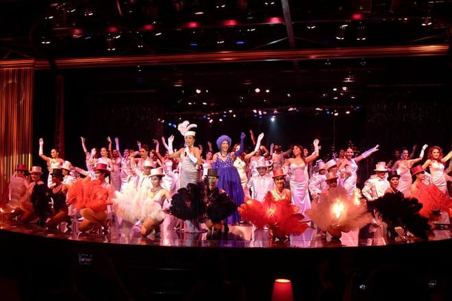 Dazzling costumes, colorful lighting &amp; impressive stage sets