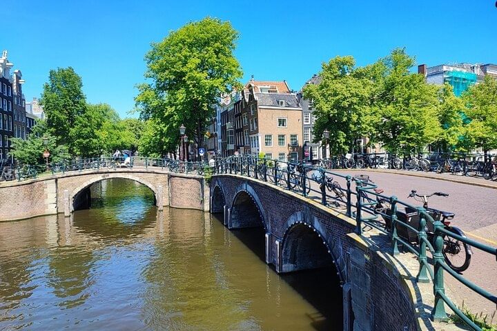 View of the road of the Amsterdam scavenger hunt passing a bridge