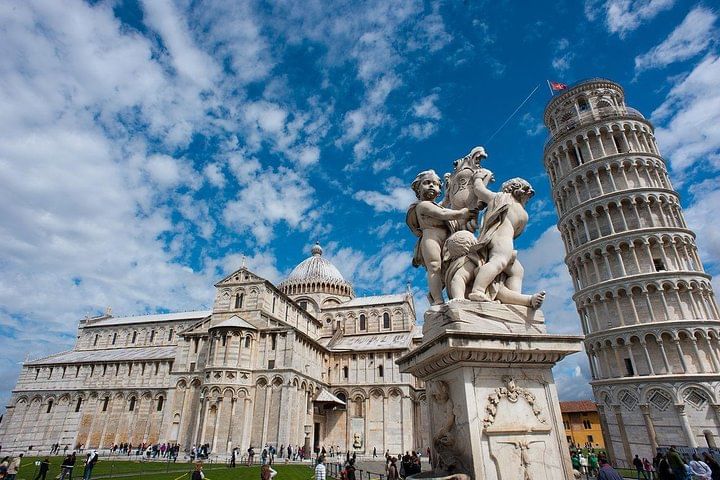External view of Piazza dei Miracoli in Pisa with the Cathedral and the Leaning Tower in the background