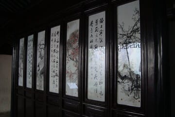 Shanghai to Suzhou by bullet train visit gardens and canal tour.