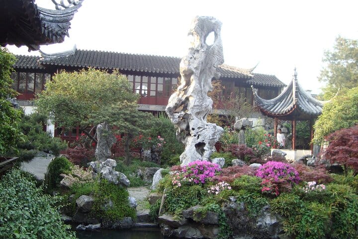 Shanghai to Suzhou by bullet train visit gardens and canal tour.