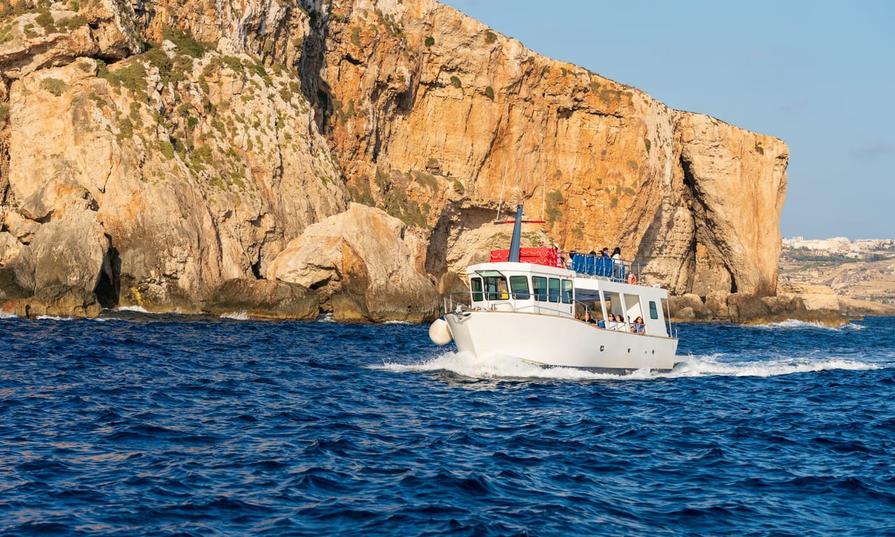 Boat Cruise to Halfa Rock, Blue Lagoon, Crystal Lagoon and Caves 10