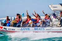 Dive into the Dubai Marina skyline! Blast off from the iconic Marina and speed past the towering residential canyons toward Atlantis on thrilling Dubai Speedboat: Iconic Marina to Atlantis Adventure!