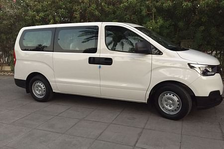 Van hire with driver for 10 hours in Abu Dhabi