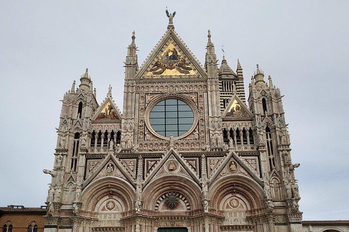 View of the richly decorated façade of Siena's Cathedral