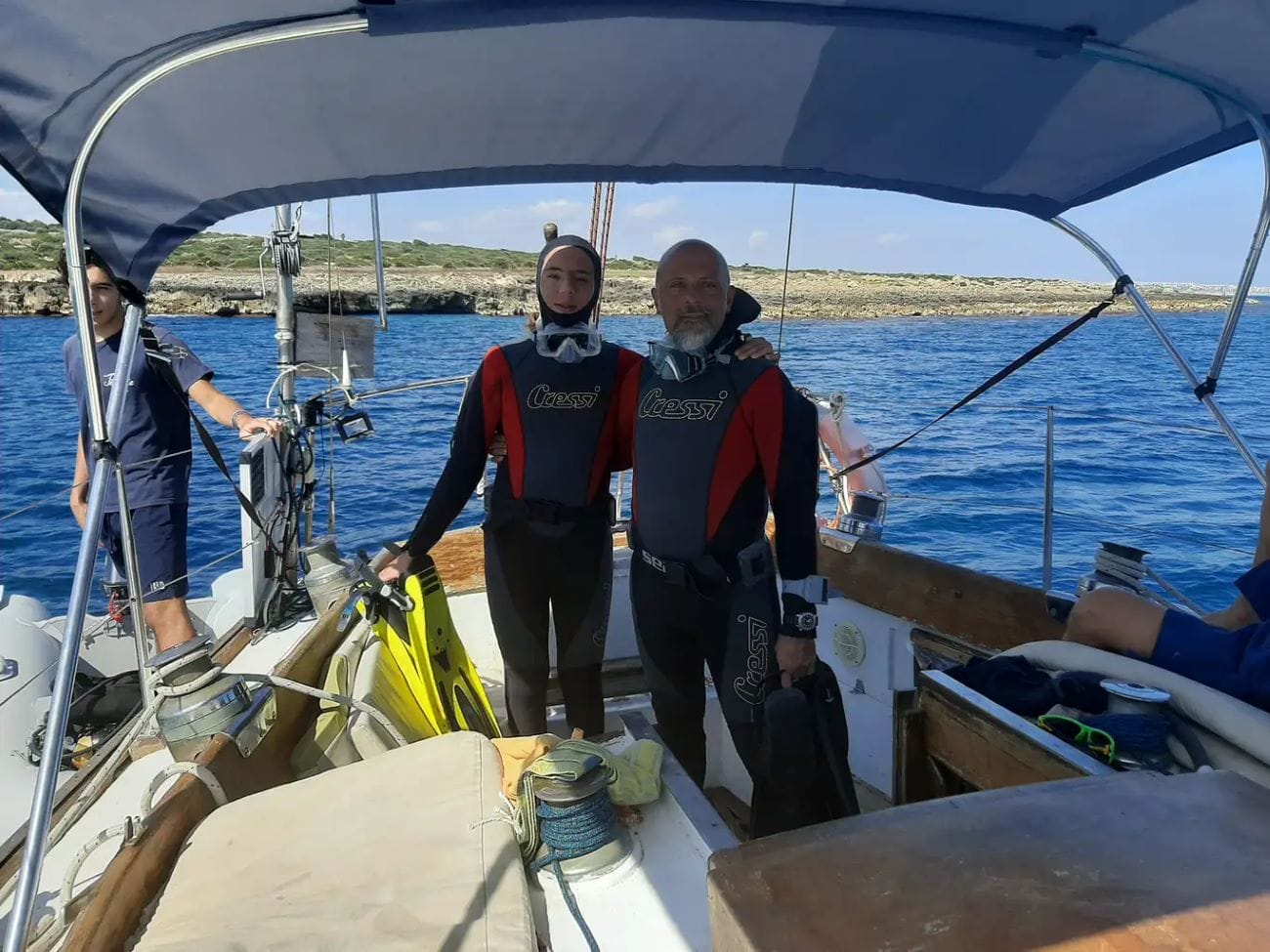 Two tour participants on boat in Siracusa
