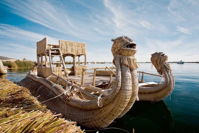 See how the islands and their structures are built and maintained using totora reeds.