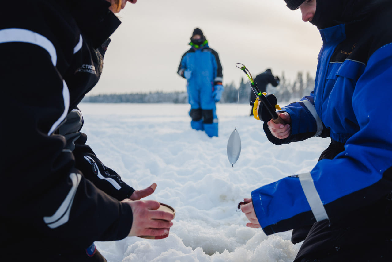 Ice Fishing and Snowmobile Safari Combo in Lapland 7