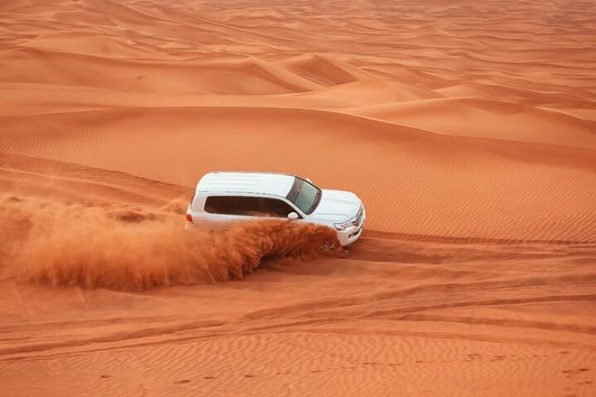 Desert Safari Camel Ride BBQ Dinner Sunset View Ras al Khaimah photo 3