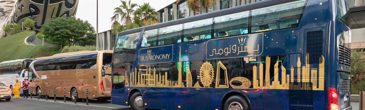 Dubai: Bustronomy Gourmet Brunch, Afternoon Tea, or Dinner on a Luxury Glass-Roof Bus!