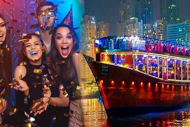 Fiesta de cumpleaños con tarta y decoraciones en Dhow Cruise Creek Dubai