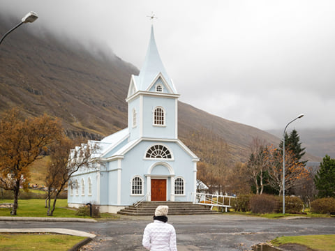 Quiet streets, mountain views, and a harbor that mirrors the sky — Seyðisfjörður serenity.