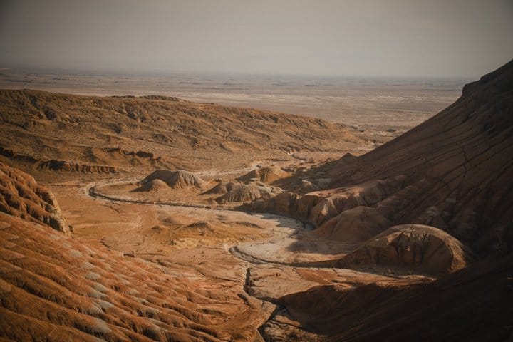 Aktau Mountains with layered rock formations inside Altyn-Emel National Park.