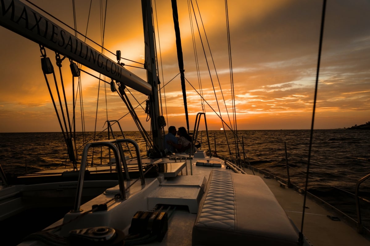 Beautiful couple enjoying the stunning sunset in Curacao on private tour Maxie Sailing
