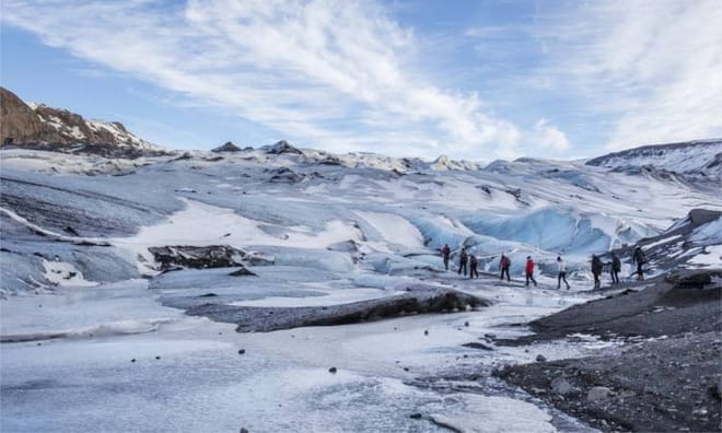 Wild South Coast | Waterfalls, Black beach and Glacier Hike | Small Group Day Tour photo 5