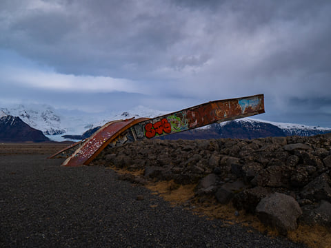 This is a monument to the power of nature- from volcanic heat and glacier flooding which twisted this bridge. Skeiðará Bridge.