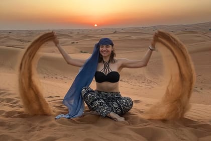 Exclusive Desert Safari Camel Ride Sandboard & Buffet BBQ Dinner
