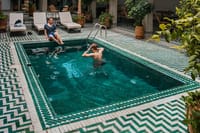 Experience the luxury of a Moroccan riad with a pool, blending traditional elegance with modern comfort.