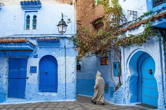 Wander through the blue-washed streets of Chefchaouen, a city full of vibrant charm.