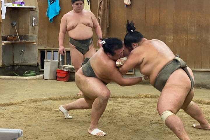 Sumo wrestlers training at a stable