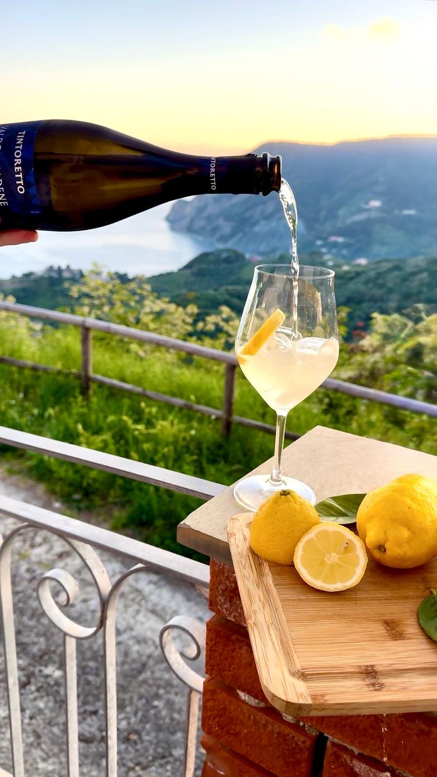 Making your lemoncino Spriz on our stunning sea-view terrace.