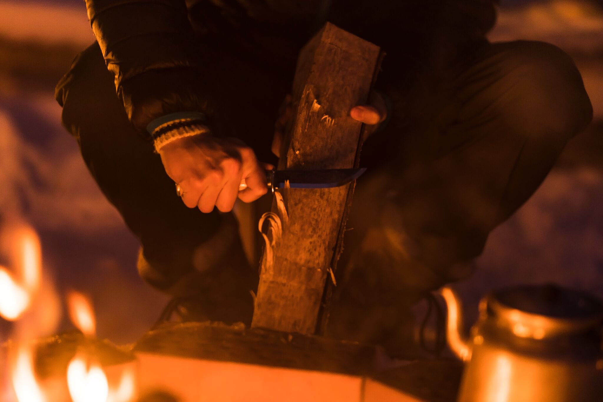 Guests can relax by a crackling campfire with warm drinks inside a traditional kota