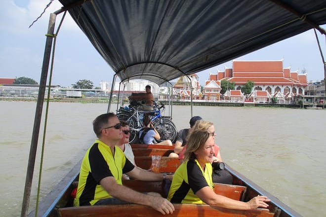 with the bikes in a long tail boat
