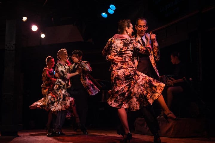 Dancers perform tango steps at the "El Querand&iacute;" venue in Buenos Aires.