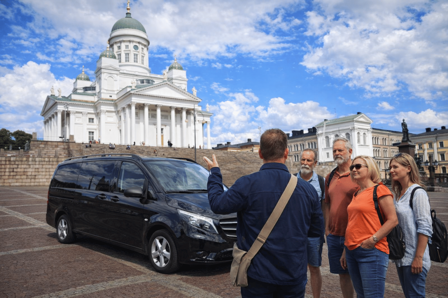Private Helsinki tour with guide and group at Helsinki Cathedral with black van