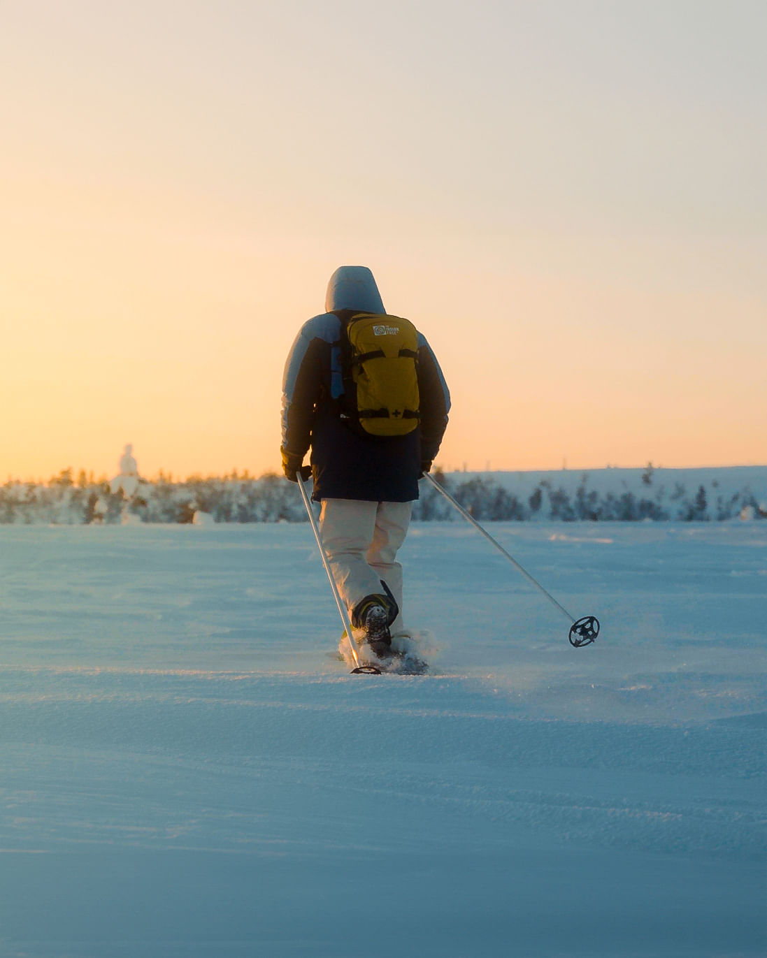 Snowshoeing through the Arctic terrain in Rovaniemi with StayLapland.