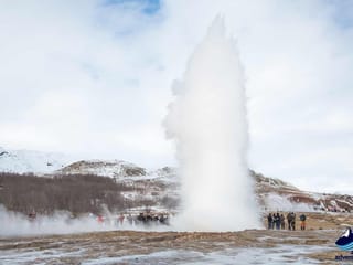 Geothermal geysir strokkur erupting during 4 day tour Iceland