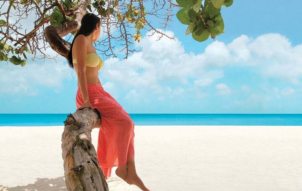 Private Day Trip to Seven Miles Beach and Rick's Cafe from Ocho Rios