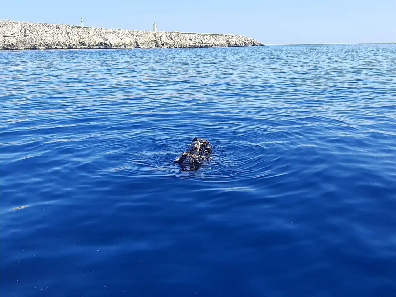 Tour participant in water in Siracusa