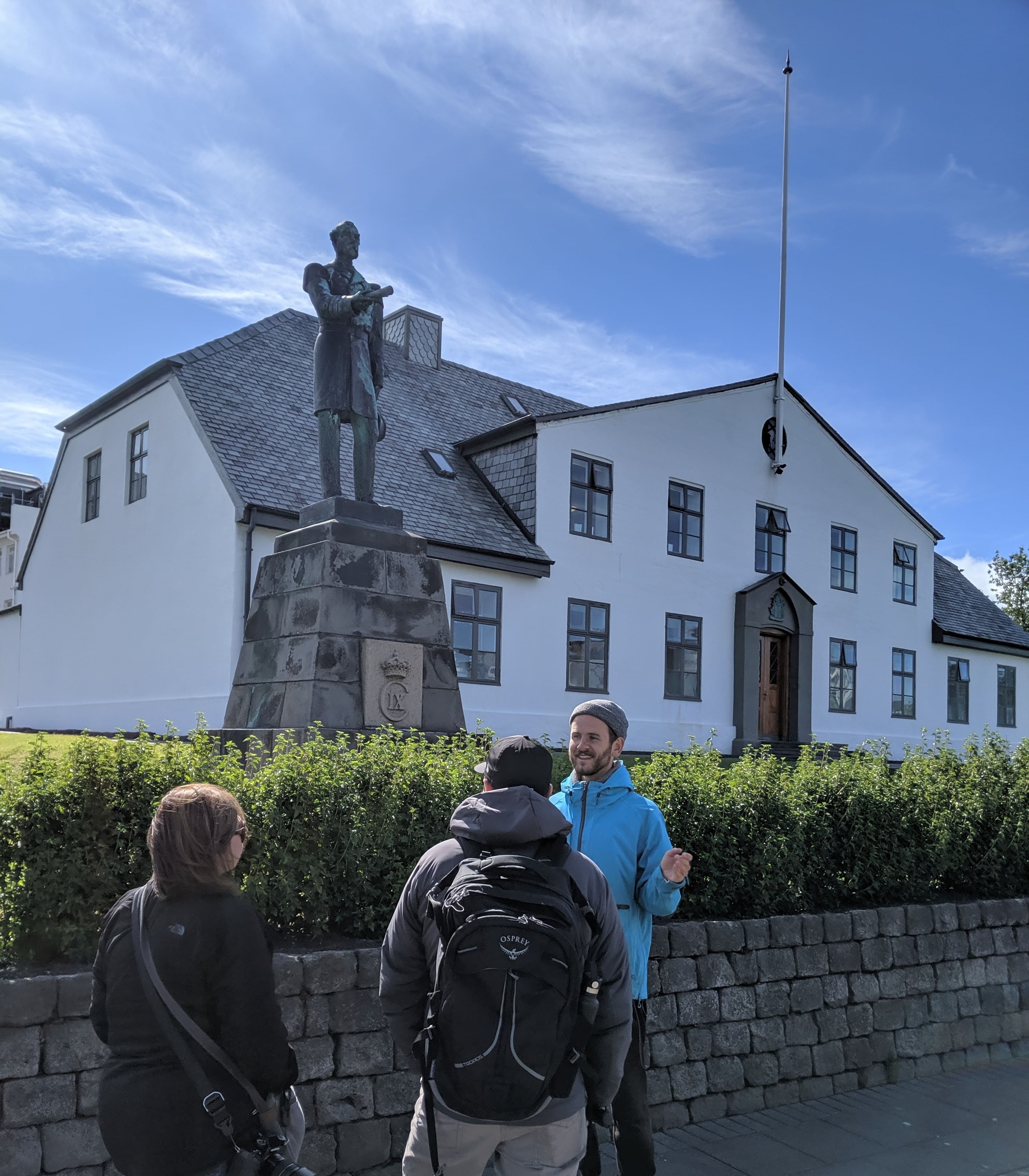A tour group walking through downtown Reykjavik