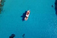 Ibiza Beach Hopper with Lunch Open Bar Paddle Surf and Snorkeling 3