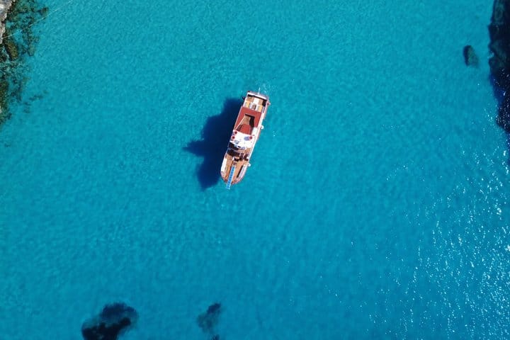 Ibiza Beach Hopper with Lunch Open Bar Paddle Surf and Snorkeling 3