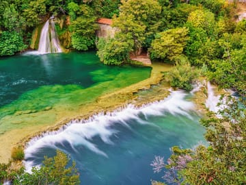 Krka Waterfalls Day Trip with Lake Cruise from Split