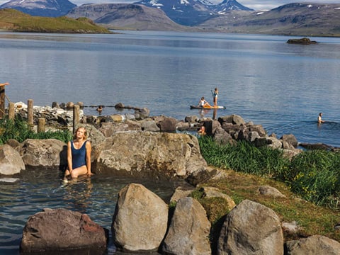 A guest enjoying themselves in the hot springs