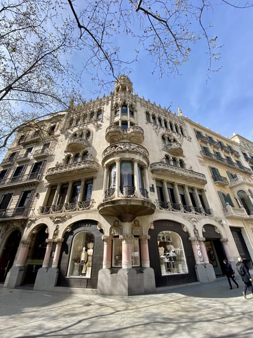 A beautiful building on the corner of a street