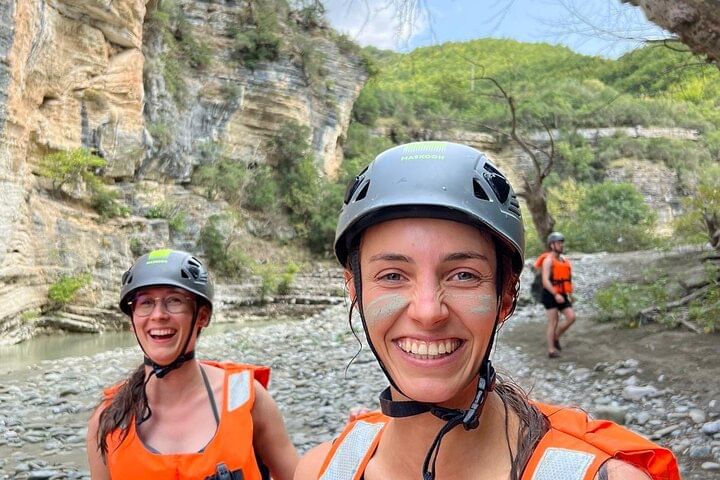 Helmets on , smiles wide - let the canyon adventure begin .