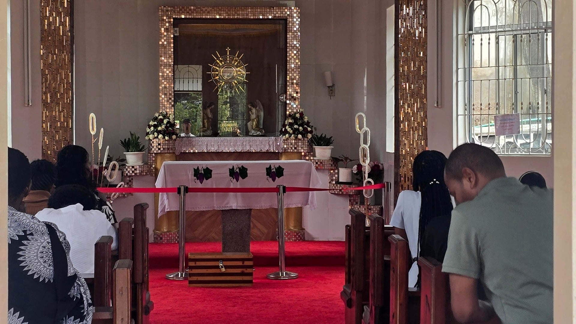 A view down the aisle toward the altar inside Christ the King Cathedral in Moshi.