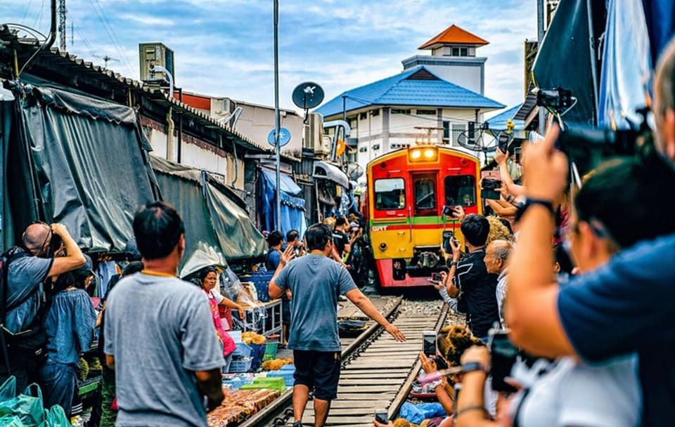 Explore Bangkok's Floating Market and Maeklong Train Market Tour
