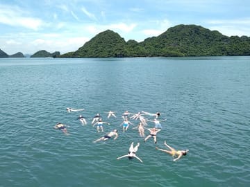 swimming in the middle of Ha Long bay