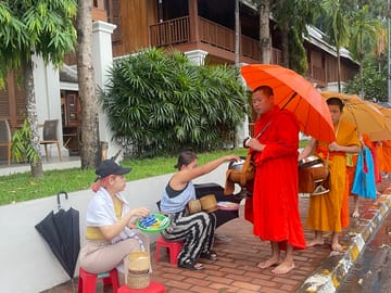 Morning Alms Giving and Kuang Si Falls Tour in Luang Prabang