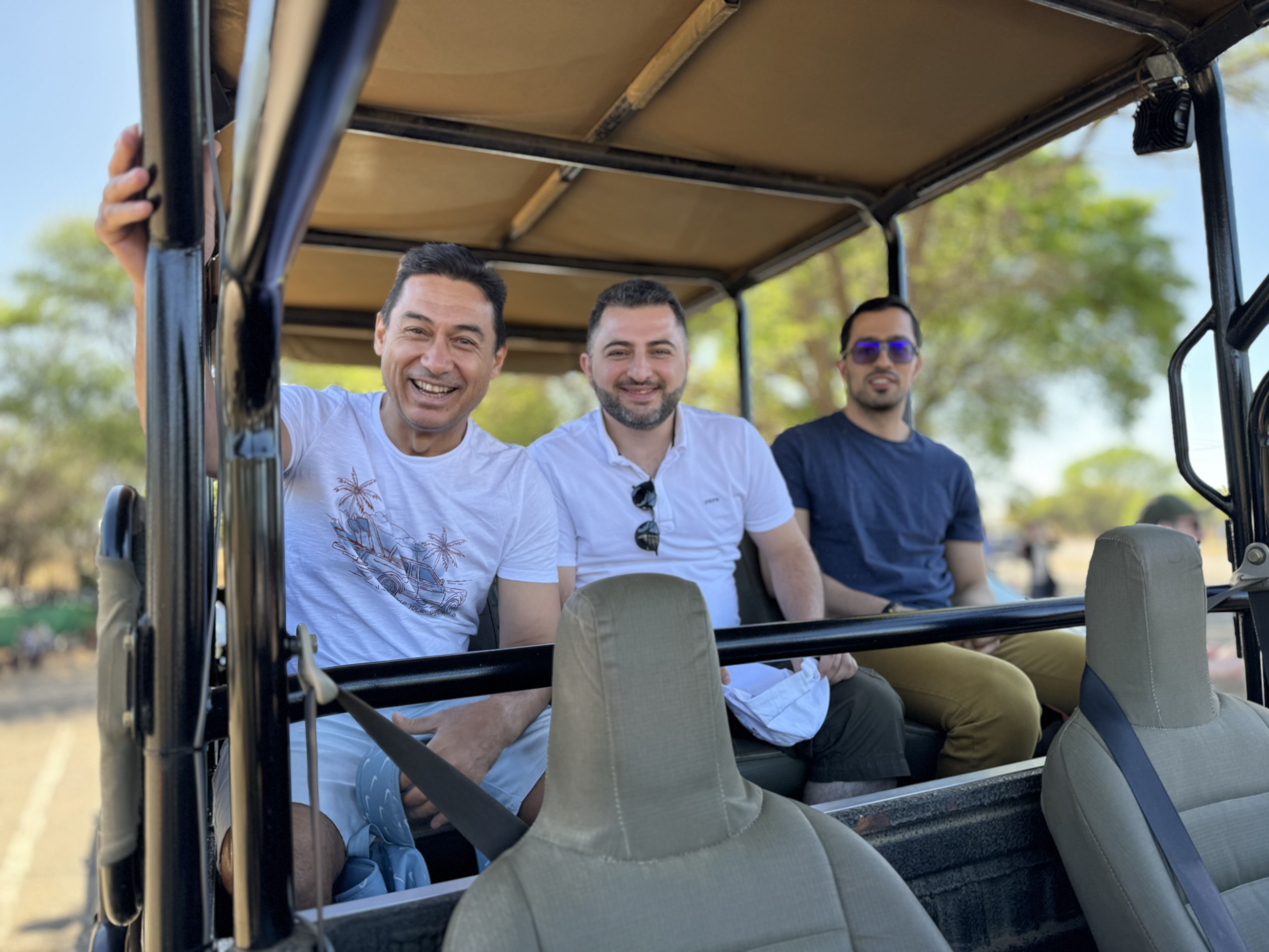 Open vehicle game drive exploring wildlife during Pilanesberg Day Tour from Johannesburg