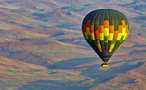 Hot Air Balloon Adventure Over Dubai's Desert Landscape
